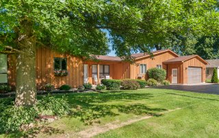 Chicago architectural exterior photography of Latham Street cedar ranch in Sandwich, Illinois.