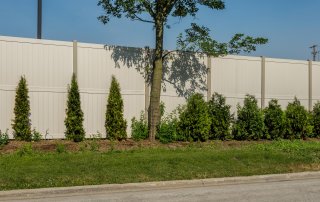 10' Rainer vinyl fence photo fence-13 installed around warehouse in River Grove, Illinois