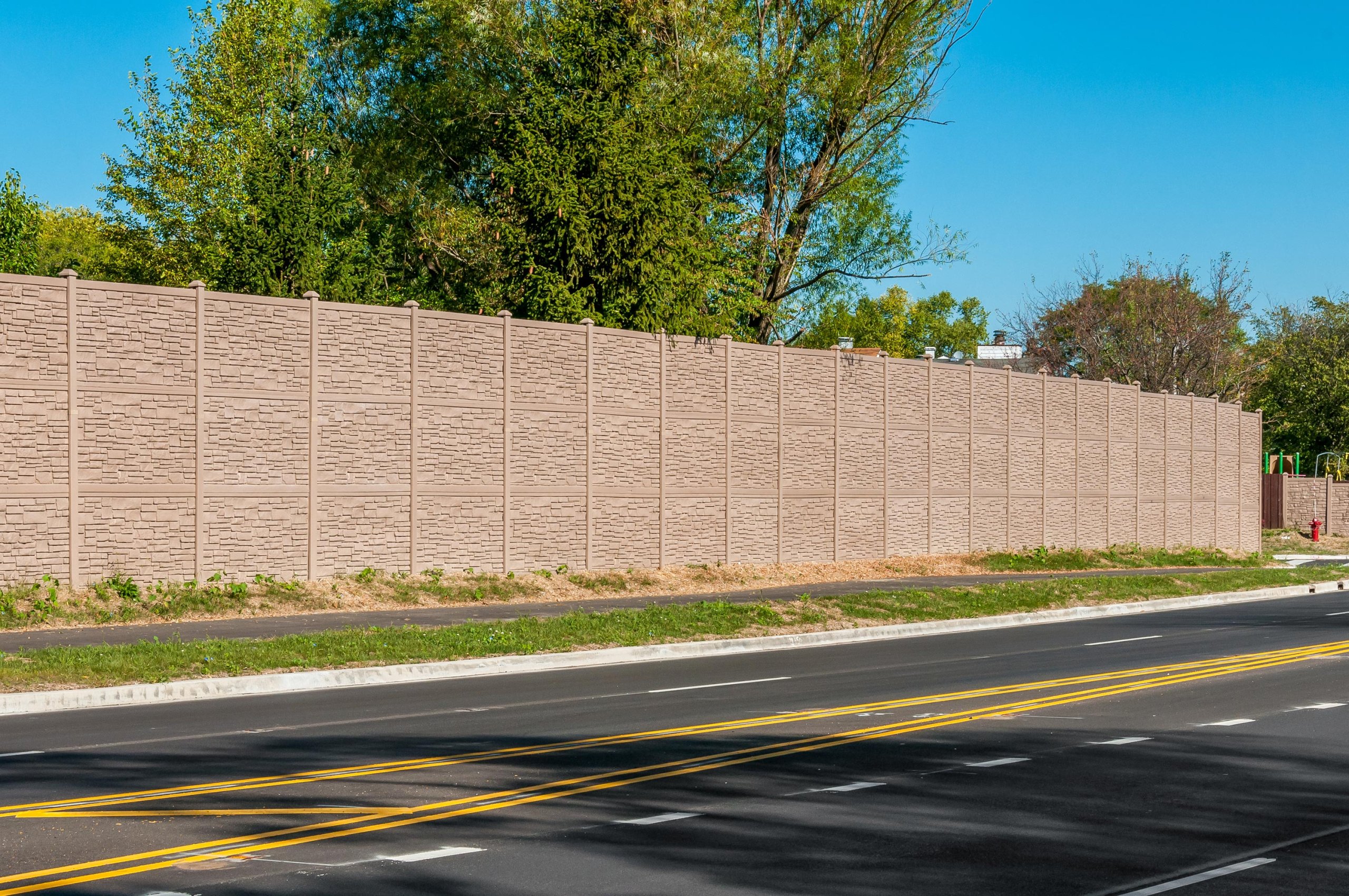 12' Vinyl Fence for IDOT project in Aurora, Illinois on Eola Road.